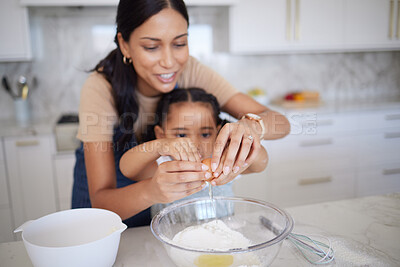 Buy stock photo Egg, baking and family with a mother and girl learning how to bake in the kitchen of their home together. Food, kids and cooking with a woman teaching her daughter how to be a chef or cook in a house