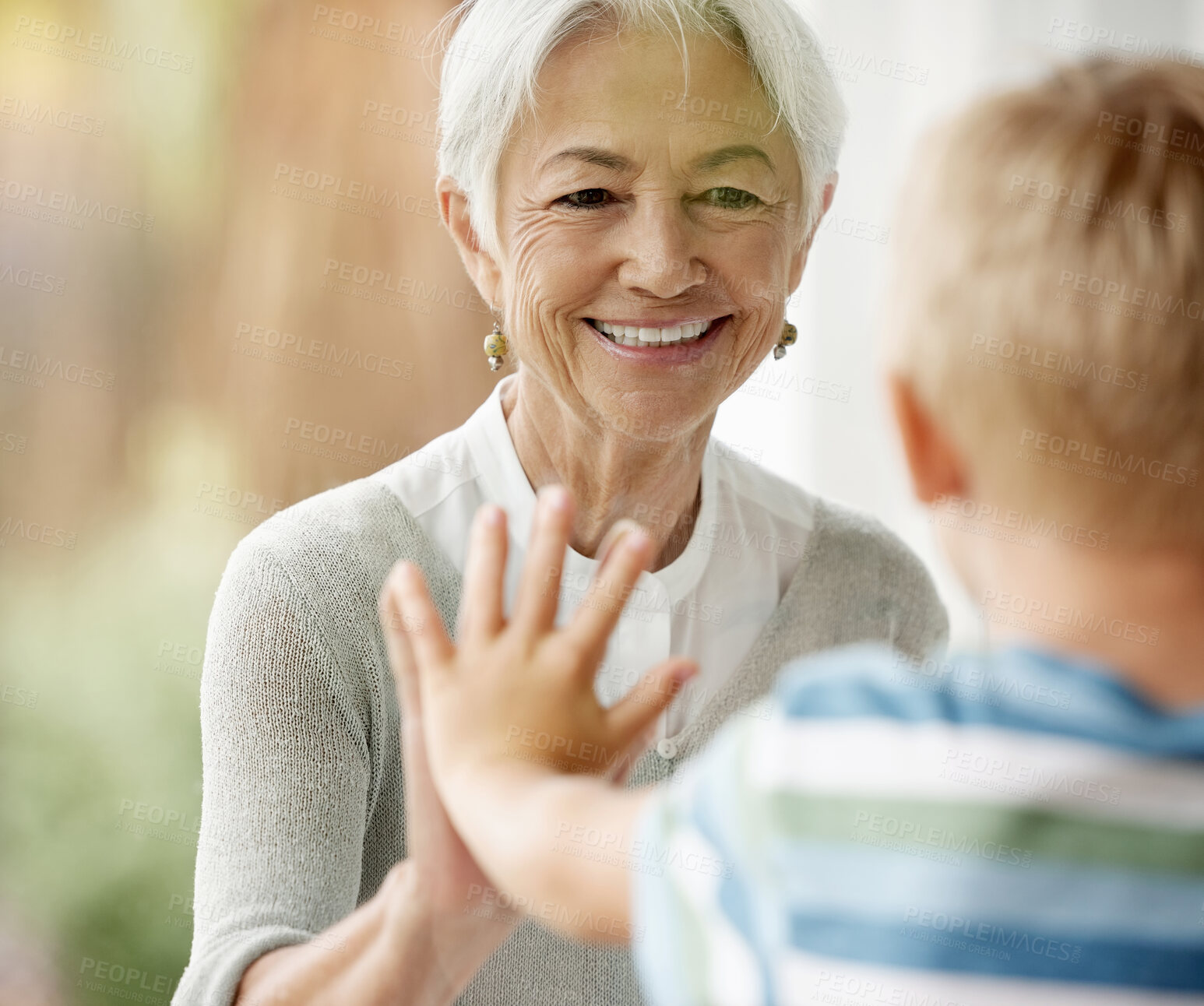 Buy stock photo Covid, family and window with grandma and boy touching through barrier for prevention and safety showing love, care and happiness. Quarantine, coronavirus and isolation with senior woman and child