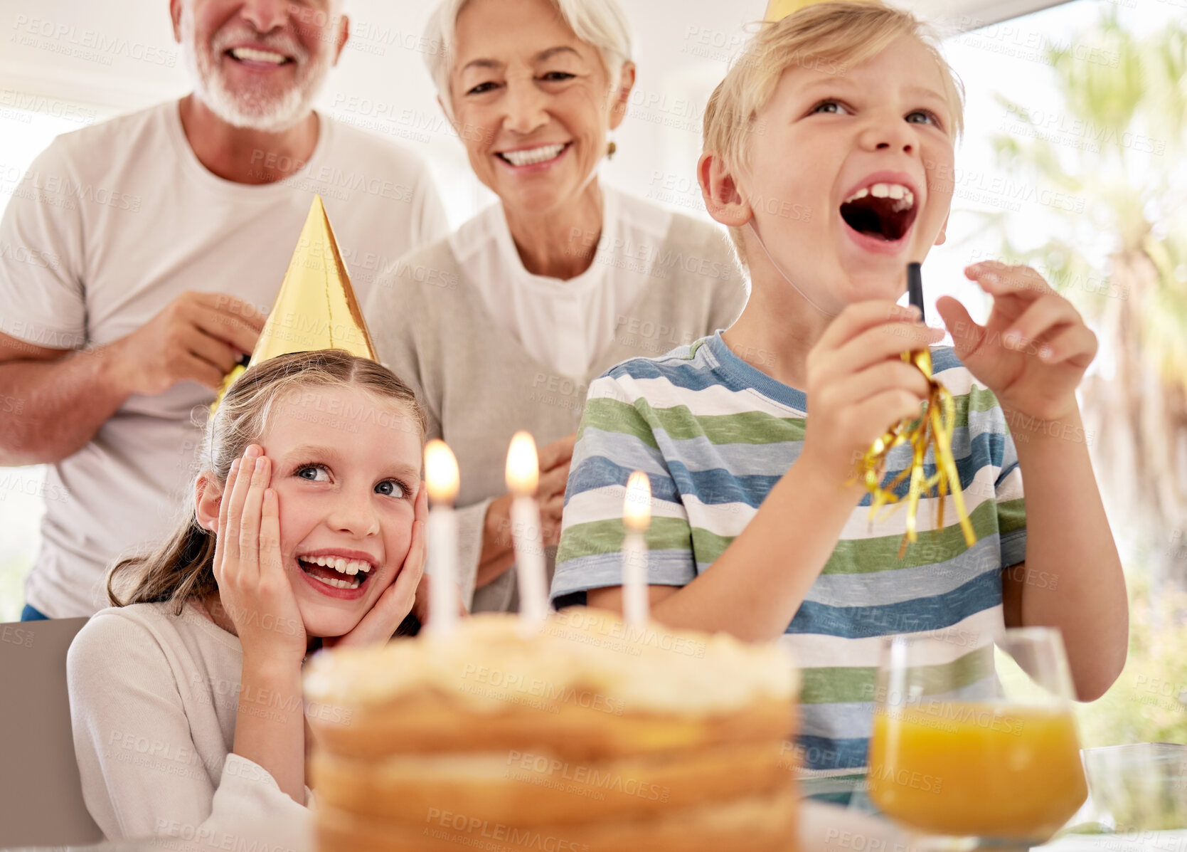 Buy stock photo Happy birthday, family and girl with a cake in a party celebration with grandparents and excited sibling or brother. Smile, happiness and young child celebrates, laughing and enjoying a special day