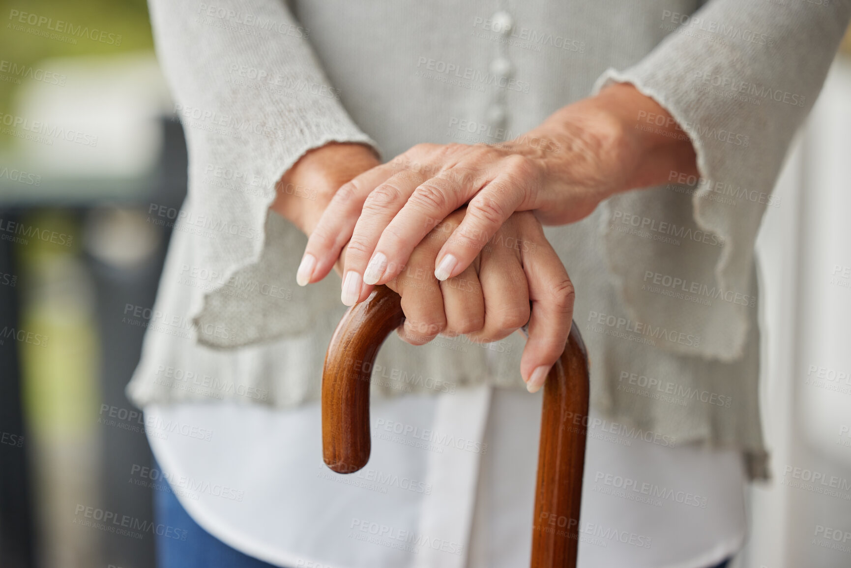 Buy stock photo Hands, walking cane and senior woman with disability leaning for help, balance and support at nursing or retirement home. Hand, mature and mobility stick for disabled elderly lady in physical therapy