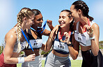 Runner, women and group with medal, winner and smile for sports, field and global competition in sun. Athlete, woman and diversity after podium, winning and celebration for marathon, stadium or park