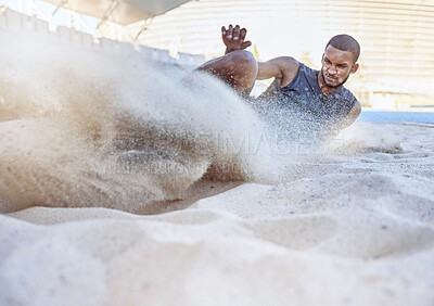 Buy stock photo Man, athlete and sand for long jump, sport and training for sports, field and global competition. Sport, motivation and goal for podium, winning and world record for jumping at arena, stadium or park