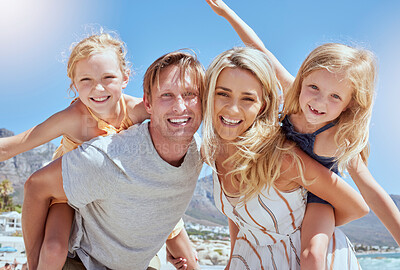 Buy stock photo Smile, travel and happy family at the beach to relax on summer holidays, vacation or weekend outdoors. Happiness, mother and father piggy back fun, playful and lovely children or kids at an ocean