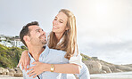 Love, beach and couple piggy back for tender moment of romance and happiness in Los Angeles. Romantic relationship with happy people dating and bonding while walking at ocean in the USA.


