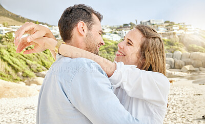 Buy stock photo Love, happy and couple on beach holiday spending a day at the sea together. Smile boyfriend and girlfriend hug on summer vacation with care or happiness. Caring husband and wife bonding on seashore