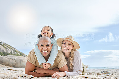 Buy stock photo Family, diversity and lying at beach, smile or portrait to relax, together and sun by sea for happiness. Woman, black man and child on vacation, holiday or travel to ocean, family and happy in summer