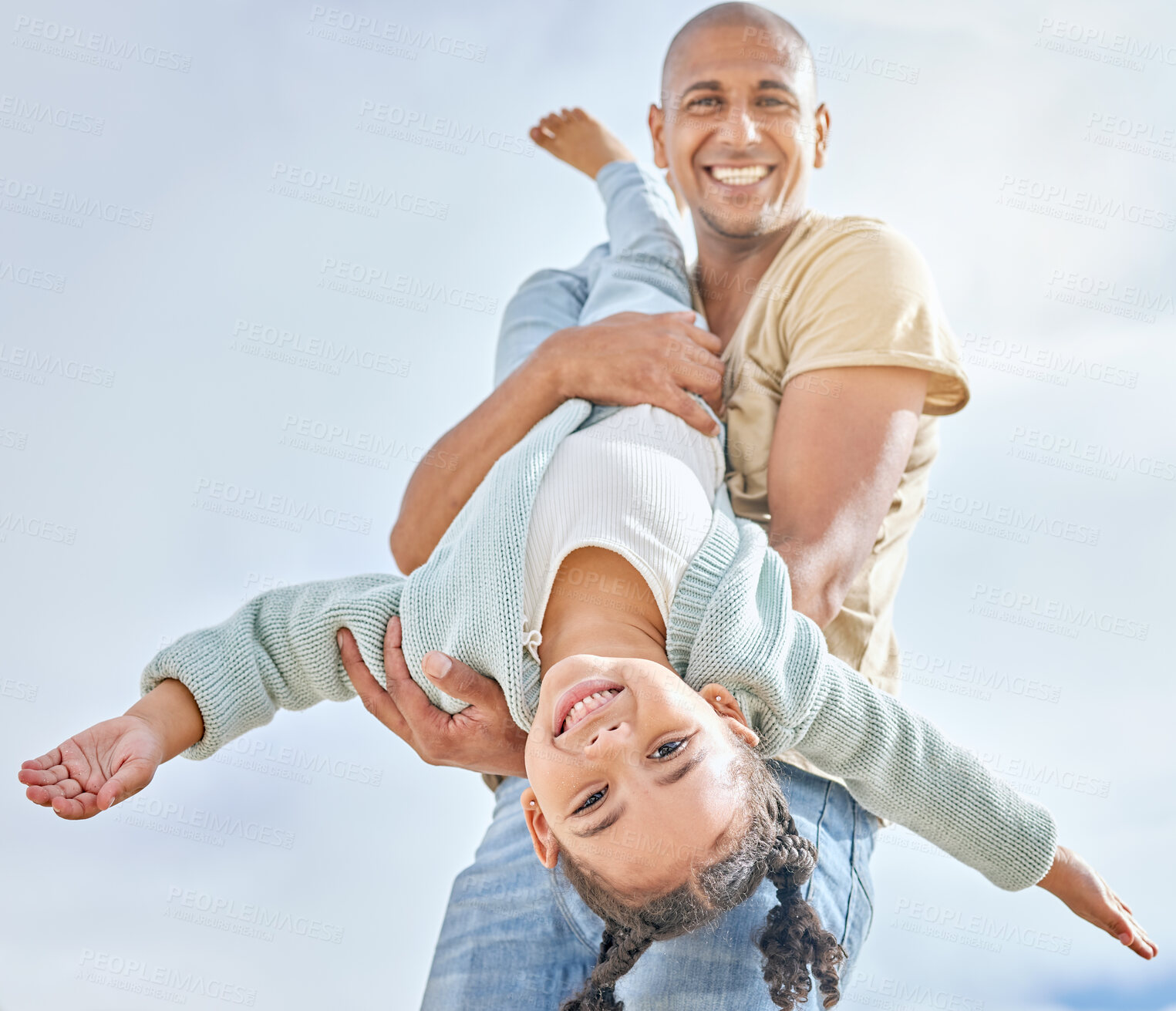 Buy stock photo Happy, summer with father and girl playing together with love, care and happiness. Upside down child with a happy smile with dad spending quality time outdoor having kid fun in the sun on vacation