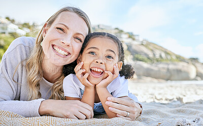 Buy stock photo Mom, beach and girl lying for portrait with love, smile or happy for adoption, outdoor or sunshine. Woman, mother and child on blanket at ocean, sand or sea on holiday, vacation or family in summer