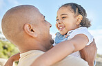 Father, girl and family relationship outdoor in nature with a happy smile and love together. Happiness hug, dad care and daughter child in the air spending quality time on a summer vacation 