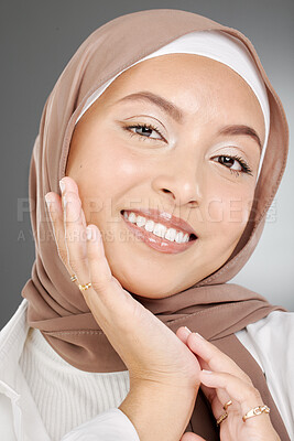 Buy stock photo Muslim, beauty woman or arab model with smile for portrait, makeup or facial skincare in grey studio background. Skin, face or happy islamic girl with fashion, confident or headshot with brown hijab