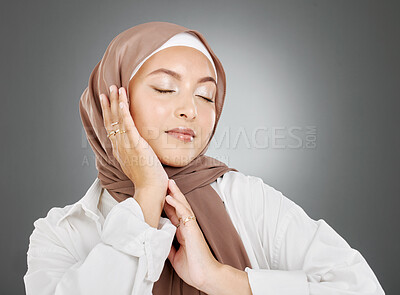 Buy stock photo Beauty, muslim and woman with hand pose for natural makeup marketing with satisfied and pretty face. Hijab, islamic and beautiful cosmetic model posing for advertising with grey studio mockup.