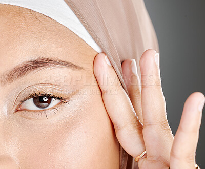 Buy stock photo Beauty, skincare and eyes of Islamic woman with natural cosmetics, makeup or anti aging routine for self care. Wellness, facial aesthetic and face portrait of Muslim girl with glowing skin and hijab