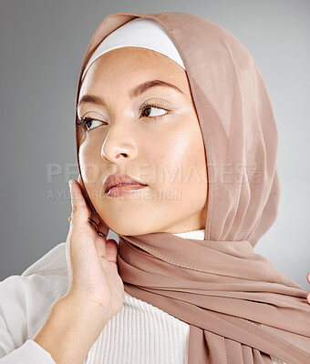 Buy stock photo Hijab fashion, muslim woman beauty and skincare, makeup and aesthetic cosmetics on studio background. Islamic religion, brown scarf and face headshot of young Saudi Arabia girl, culture and elegance