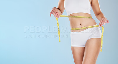 Buy stock photo Health, wellness and weightloss, woman with measuring tape on waist, healthy diet and exercise for body care. Fitness, nutrition and healthcare, motivation for fit lat stomach and tracking progress.