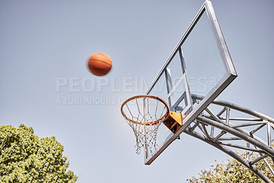 Buy stock photo Basketball net, ball and outdoor sports goals, competition game and action on sky background. Background basketball court, shooting hoops and winning target, training skill and fun performance in air