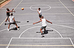 Fitness, sports and friends training on a basketball court with cardio exercise or workout in summer outdoors in Detroit. Healthy, action and young basketball players playing a game or practice match