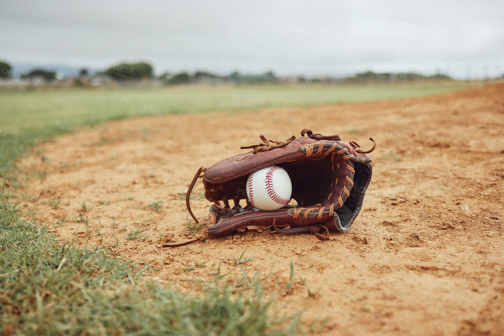 Buy stock photo Sports, baseball gloves and field ball on dirt floor after game, competition or practice match for fitness, exercise or health. Softball pitch, training ground or baseball field equipment for workout