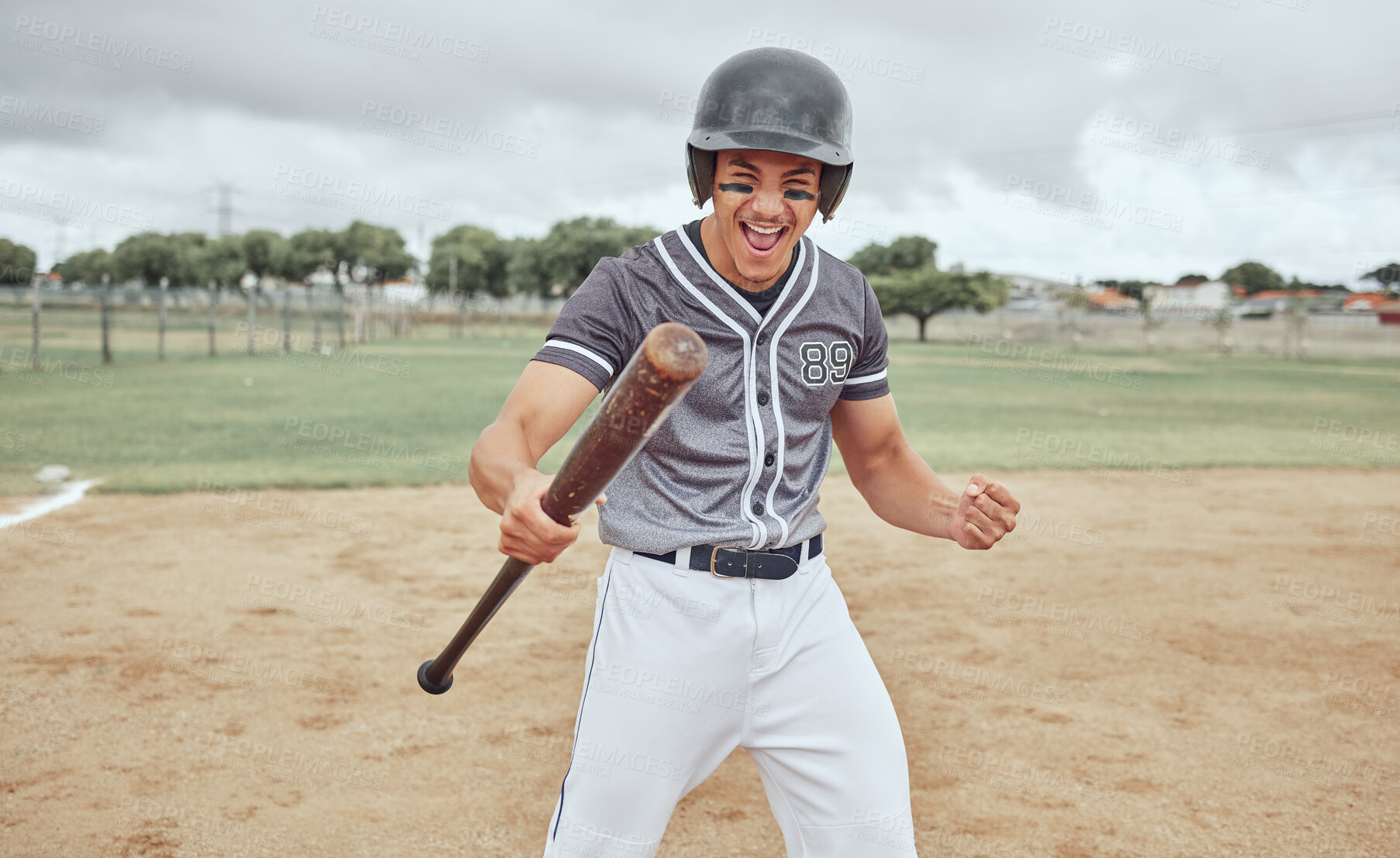 Buy stock photo Baseball, man and winner in sports game, celebration or winning on the pitch in the outdoors. Baseball player in sport celebrating match win, point or score for hitting a home run on the field