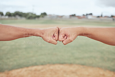 Buy stock photo Hands, fist bump and friends outdoor in nature for partnership, friendship and support on a field. Baseball or softball pitch, team building and men athletes doing a solidarity gesture together.