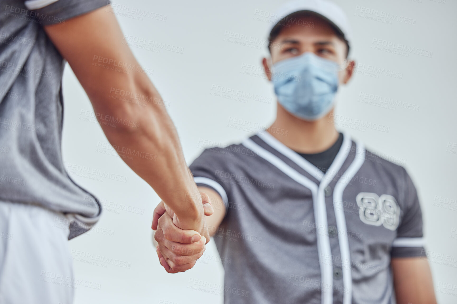 Buy stock photo Baseball player, hands and together for covid with mask, respect or game for win, pandemic or coronavirus. Man, sports and handshake in ppe for safety at baseball match, contest or field in New York