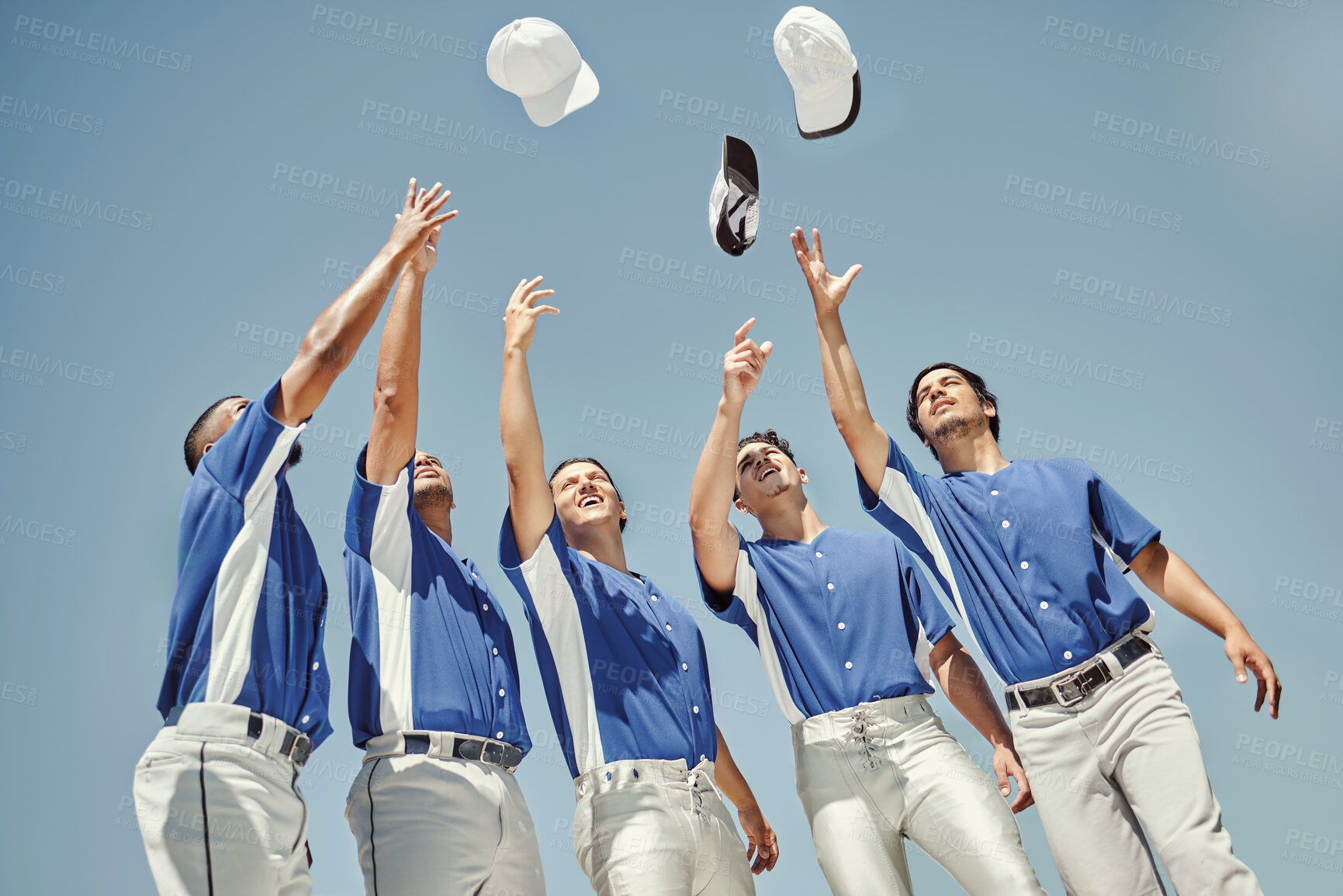 Buy stock photo Baseball, hats and team in celebration at a game, solidarity for sports and support for partnership. Group of athlete friends throwing caps for success, win and to celebrate their teamwork in sport