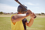 Baseball, training and baseball player hold bat for fitness workout holding bat on field outdoor. Athlete batter man, professional sports and pitch for health and wellness exercise for softball game