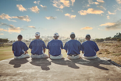 Buy stock photo Baseball, sports and sky with a man team sitting outdoor in a grass pitch or field before a game or match. Fitness, teamwork and view with a male sport group outside together for training or practice