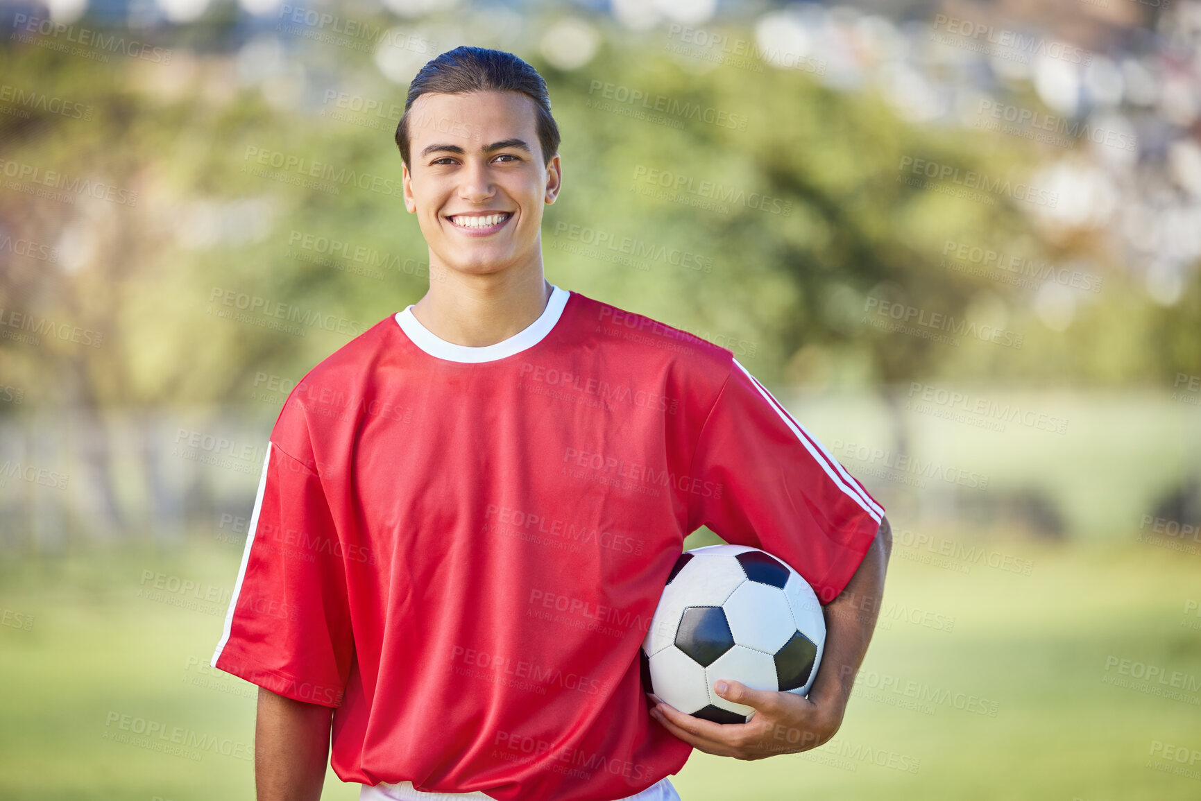 Buy stock photo Soccer, sports and fitness with a man athlete holding a ball on a field or grass pitch for training. Football, workout and exercise with a male player outdoor for health, wellness or practice