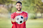 Soccer player, soccerball and sports man with ball after training exercise for game competition. Happy football athlete, smiling and ready for professional athletic sport peformance for match fitness