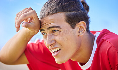 Buy stock photo Soccer, sports and sweat with a tired man outdoor for a competitive game or match during the day. Football, fitness and health with a soccer play outside for exercise, a workout or competitive sport