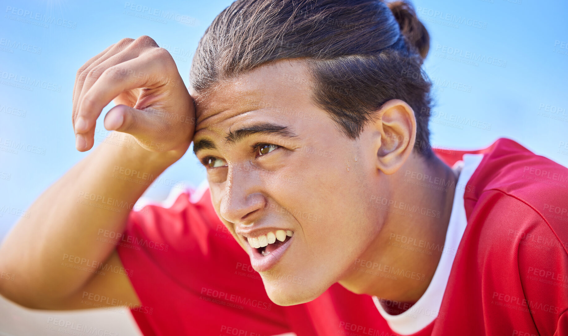 Buy stock photo Soccer, sports and sweat with a tired man outdoor for a competitive game or match during the day. Football, fitness and health with a soccer play outside for exercise, a workout or competitive sport