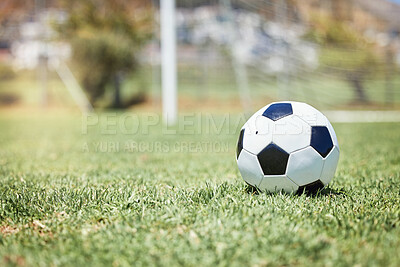 Buy stock photo Soccer, sports and a ball on an empty pitch or field for fitness, exercise or training with a wellness lifestyle of health. Football, workout and game with sport equipment on the ground for a match
