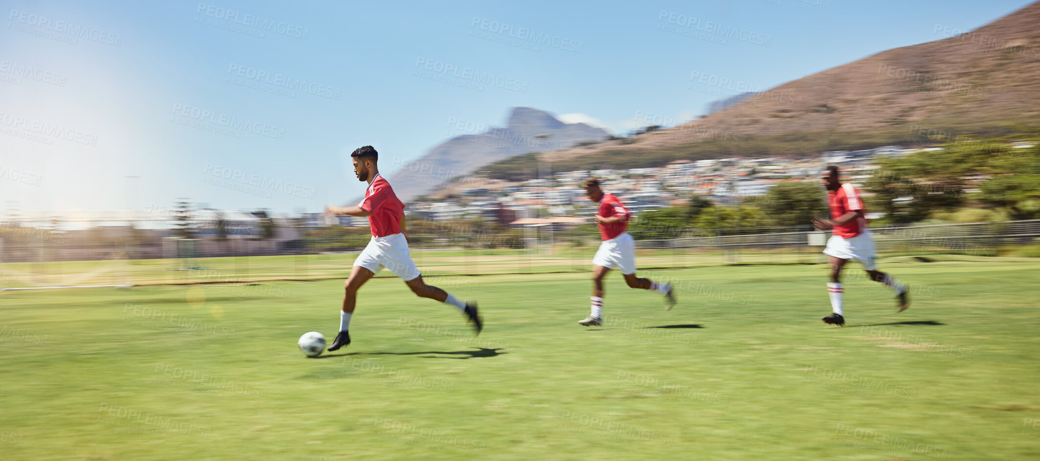 Buy stock photo Soccer player, running and soccer ball team sports competition game, grass pitch and goals of winning score in South Africa. Motion blur professional athlete, football field action and outdoor energy