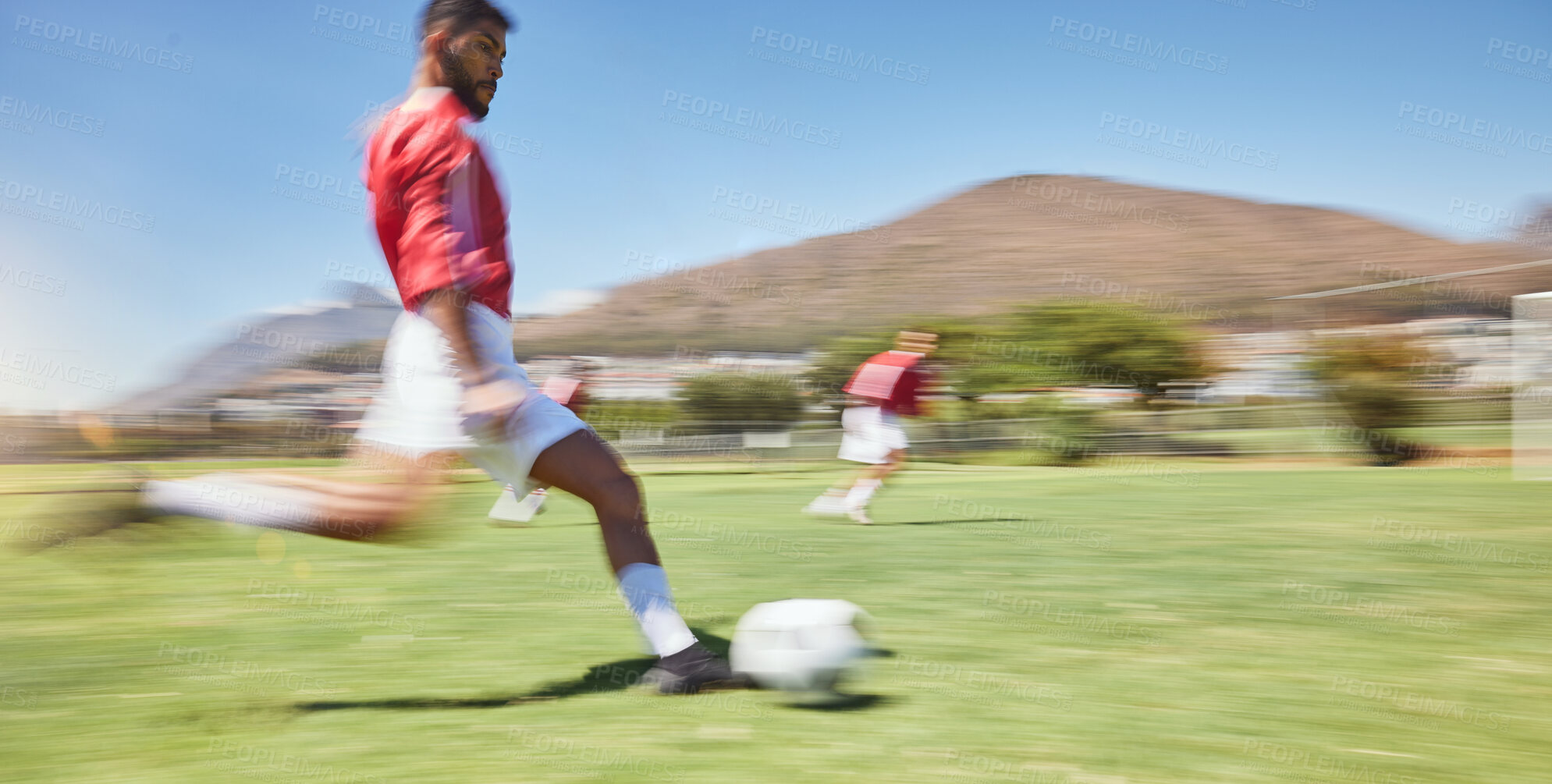 Buy stock photo Action, soccer player and man kick soccer ball on grass pitch, sports competition and team game, goals and winning score. Motion blur football field athlete, running action or outdoor training energy