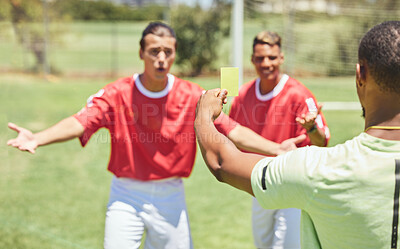 Buy stock photo Man, soccer player and yellow card from referee for sports foul, misconduct or unfair play on the field. Confused men in soccer match getting a warning, sign or penalty for fail in football game law