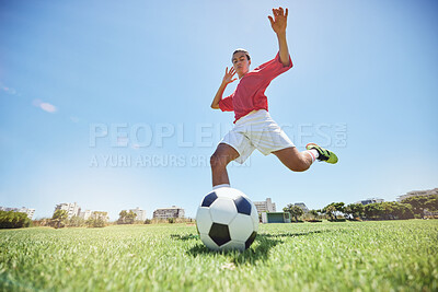 Buy stock photo Soccer ball kick, sport and man athlete ready for team exercise, fitness and exercise game training. Football workout of a soccer player playing sport on an field in nature for cardio and wellness