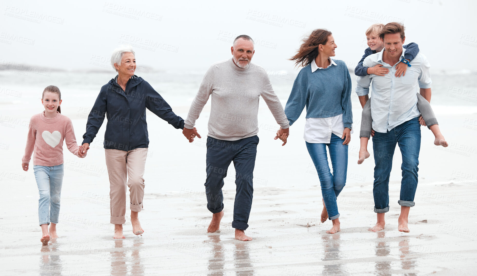 Buy stock photo Beach, walking and big family on exercise while on vacation in Australia during summer in water. Happy Grandparents, parents and children on outdoor health walk while on adventure, journey or holiday