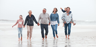 Buy stock photo Family, beach and children with grandparents, parents and kids walking in the water on the sand in a summer holiday. Travel, love and vacation with a girl, boy and relatives taking a walk by the sea