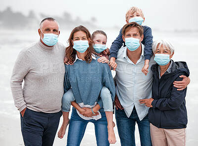 Buy stock photo Covid, family and ocean portrait with children in Germany with corona virus protection mask. Love, care and big family bonding at beach with coronavirus face mask for safety of grandparents.

