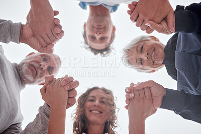 Buy stock photo Family, below and holding hands in circle with smile, love and bonding together outdoor. Mom, dad and grandparents with support, unity and trust for care, happiness and help while happy on vacation