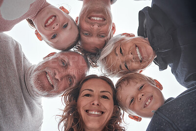 Buy stock photo Family, children and grandparents with a girl, boy and parents standing in a huddle or circle outdoor from below. Kids, love and bonding with a man, woman and grandkids spending time together closeup