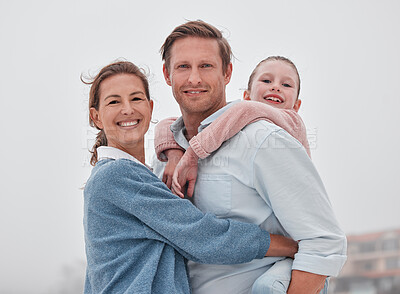 Buy stock photo Family, hug and outdoor, love and smile, together in nature and bonding in travel portrait. Parents, child and happy, hugging and piggy back, father with mother and girl, spending quality time.