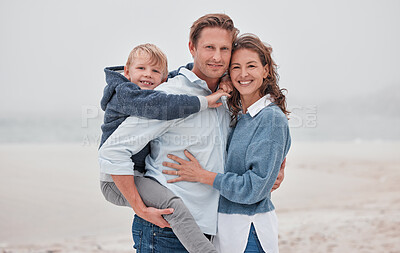 Buy stock photo Family beach, child travel and parents smile on holiday by the tropical water on island in South Africa during autumn. Portrait of a happy mother, father and boy with love on vacation by the ocean
