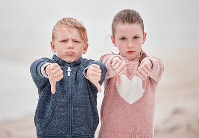 Buy stock photo Sad children portrait, hands thumbs down or outdoor with news of negative Ukraine problem to protest war. White siblings vote no, angry emoji in cold winter and sign language rejection gesture