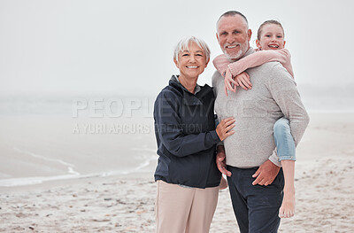 Buy stock photo Family, beach and children with grandmother, grandfather and boy on the sand by the sea during summer vacation. Travel, kids and retirement with a male child, man and woman enjoying an ocean holiday
