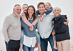 Big family, happy and outdoor of a hug with parents, grandparents and children with happiness. Portrait of mother, father and kids with care, love and a smile together with senior people hug