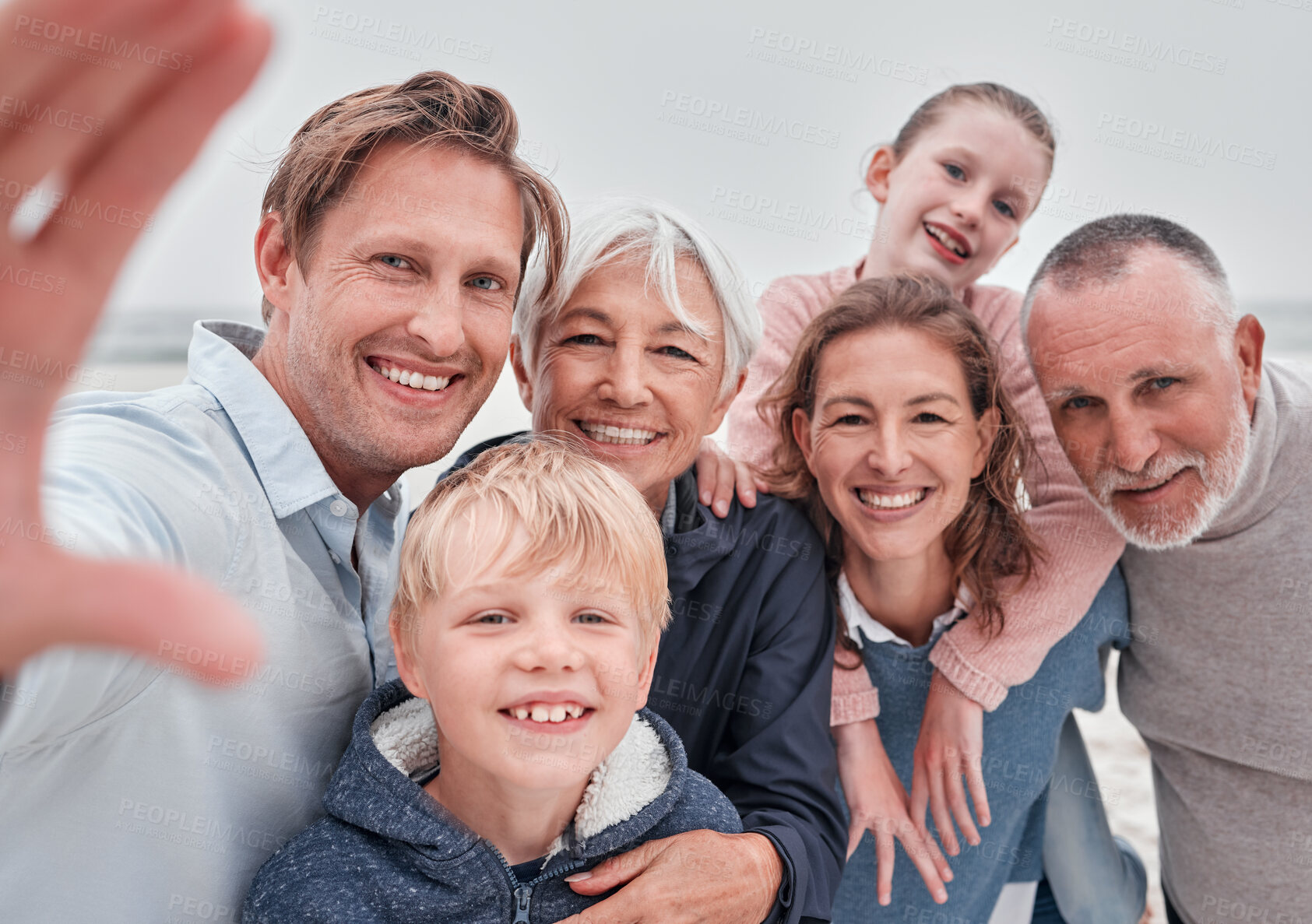 Buy stock photo Selfie, smile and portrait of happy family on the beach for winter fun, bond and enjoy quality time together. Love, nature and big family on Toronto Canada vacation for peace, freedom and wellness