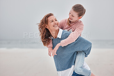 Buy stock photo Mother, child and piggyback for love on beach with smile for quality bonding time together in nature. Mama and kid smiling in joyful happiness for back ride embracing relationship on sandy ocean walk