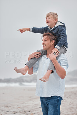 Buy stock photo Father, child and piggyback pointing on the beach for walking, bonding and quality time together in the outdoors. Dad, kid and shoulder ride by the ocean for fun walk with smile in happiness outside