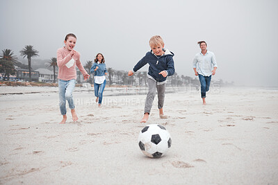 Buy stock photo Soccer, summer beach activity and family running and playing  with energy and happiness. Happy sea sport and football game with mom, dad and children on sand with a smile on vacation with kids